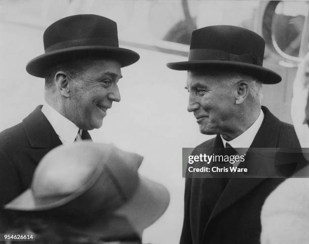 British Foreign Secretary John Simon, 1st Viscount Simon chats with Baron Leopold von Hoesch , the German Ambassador to the UK, at Croydon Aerodrome,...