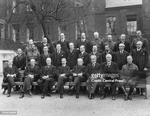 The Imperial War Cabinet of 1917 at 10 Downing Street in London during World War I. From left to right Arthur Henderson, Lord Milner, Lord Curzon, Mr...