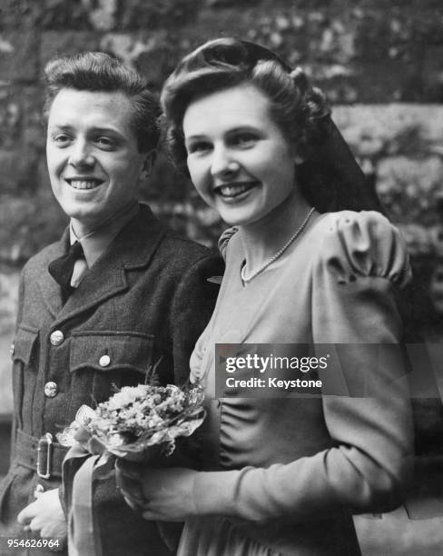 British actor Richard Attenborough and his wife, actress Sheila Sim leave the church after their wedding at St Mary Abbots in Kensington, London,...