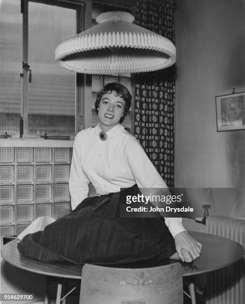 English actress Maggie Smith at her home in Belsize Park, London, September 1957.