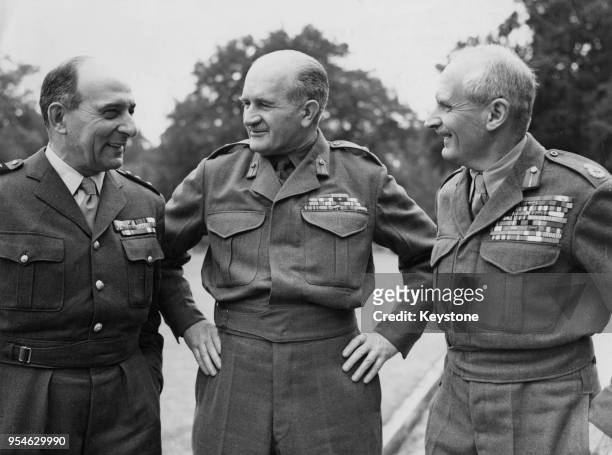 From left to right, French commander Jean de Lattre de Tassigny with British military leaders William Slim and Bernard Law Montgomery during World...