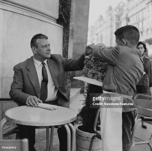 Otto Skorzeny , a former officer in the Waffen-SS, orders a biscuit at a pavement cafe in Spain, April 1959. In 1943 he was sent by Hitler to rescue...
