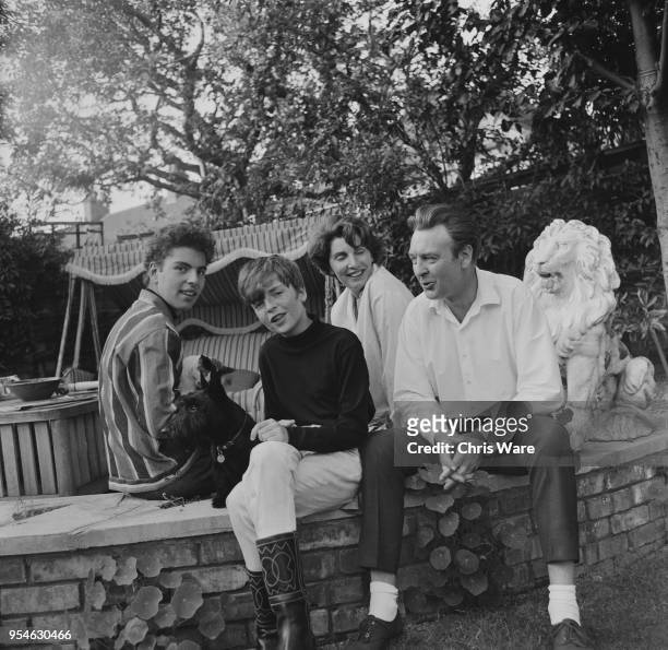 English actor Donald Sinden at his home in Golders Green, London, with his wife Diana and their children Marcus and Jeremy , August 1966.