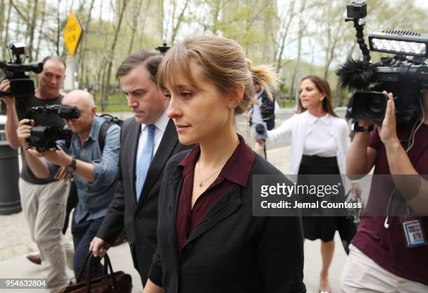 Actress Allison Mack departs the United States Eastern District Court after a bail hearing in relation to the sex trafficking charges filed against...