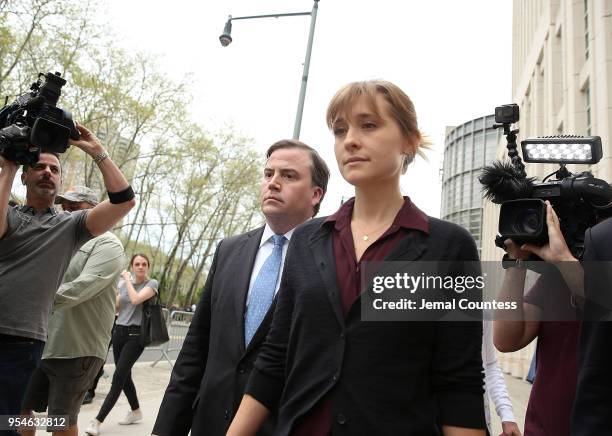 Actress Allison Mack departs the United States Eastern District Court after a bail hearing in relation to the sex trafficking charges filed against...