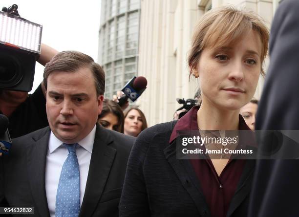 Actress Allison Mack departs the United States Eastern District Court after a bail hearing in relation to the sex trafficking charges filed against...