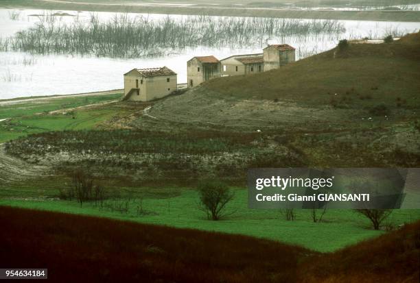 Houses on the shore of the lake of Conza in the Campania region, November 2000, Southern Italy.
