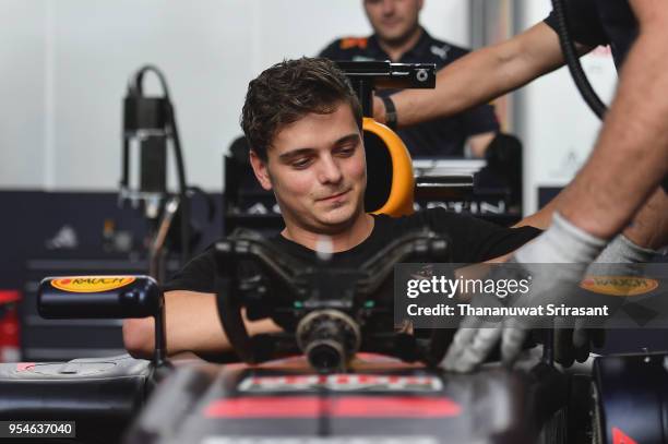 Martin Garrix samples the car during the Red Bull Racing Vietnam show run on May 4, 2018 in Ho Chi Minh City, Vietnam.