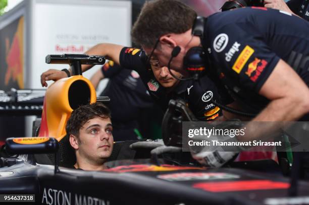 Martin Garrix samples the car during the Red Bull Racing Vietnam show run on May 4, 2018 in Ho Chi Minh City, Vietnam.