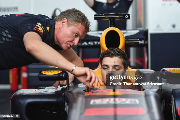 Martin Garrix meets David Coulthard of Scotland and Red Bull Racing during the Red Bull Racing Vietnam show run on May 4, 2018 in Ho Chi Minh City,...