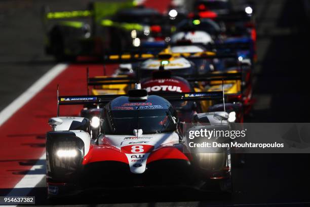 In the Toyota TS050 - Hybrid driver Fernando Alonso of Spain gets ready to compete during the Qualifying session in the WEC 6 Hours Of...