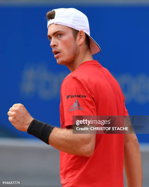 Germany's Maximilian Marterer reacts during his quarter final match against Hungary's Marton Fucsovics at the ATP tennis BMW Open in Munich, southern...