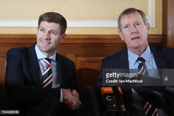 Steven Gerrard shakes hands with Dave King as he is unveiled as the new manager of Rangers football Club at Ibrox Stadium on May 4, 2018 in Glasgow,...