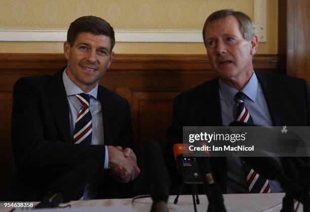 Steven Gerrard shakes hands with Dave King as he is unveiled as the new manager of Rangers football Club at Ibrox Stadium on May 4, 2018 in Glasgow,...