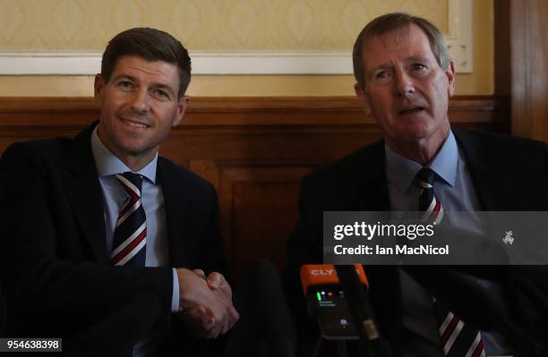 Steven Gerrard shakes hands with Dave King as he is unveiled as the new manager of Rangers football Club at Ibrox Stadium on May 4, 2018 in Glasgow,...