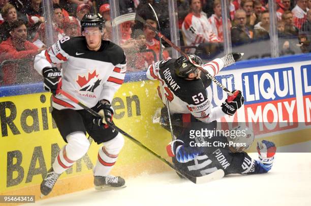 Pierre-Luc Dubois, Bo Horvat of Team Canada and Neal Pionk of Team USA during the World Championship game between USA and Canada at Jyske Bank Boxen...