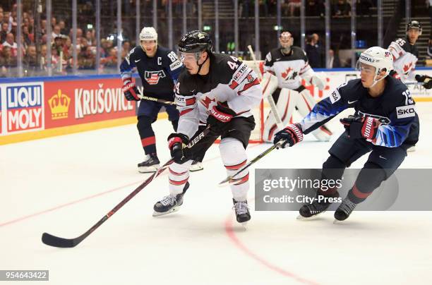 Patrick Kane of Team USA, Jean-Gabriel Pageau of Team Canada and Johnny Gauderau of Team USA during the World Championship game between USA and...