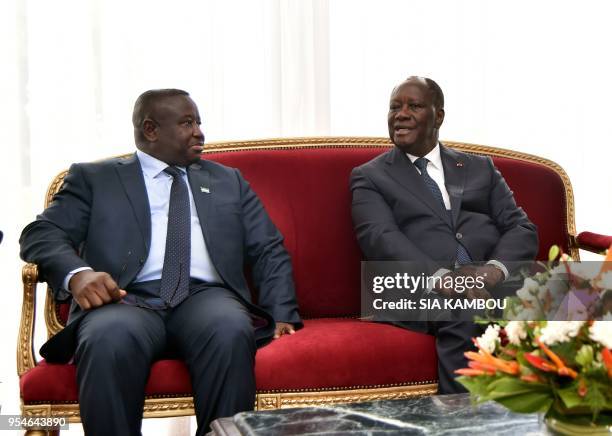 Ivorian President Alassane Ouattara and Sierra Leone president Julius Maada Bio hold a meeting on May 4, 2018 at the presidentaial palace in Abidjan.