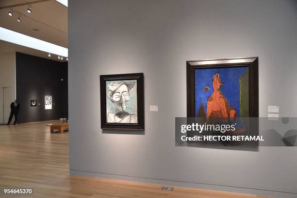 "Perro aullando a la Luna" by Rufino Tamayo and "Femme au Chapeau Assise. Buste" by Pablo Picasso are seen during a Sotheby's preview of the May...