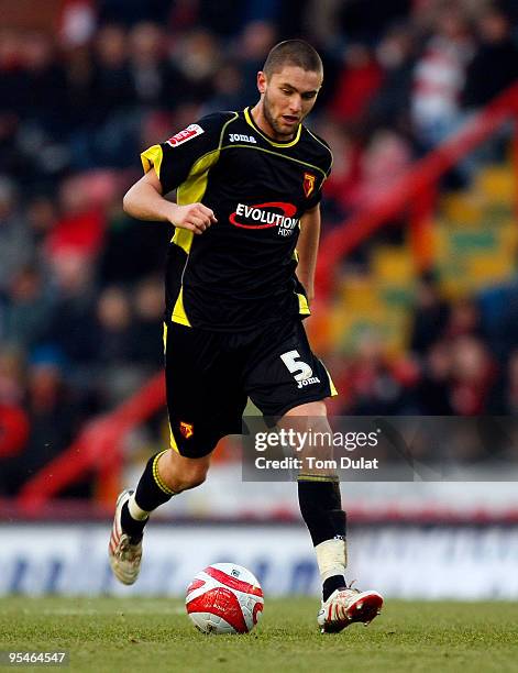 Henri Lansbury of Watford runs with the ball during the Coca Cola Championship match between Bristol City and Watford at Ashton Gate on December 28,...