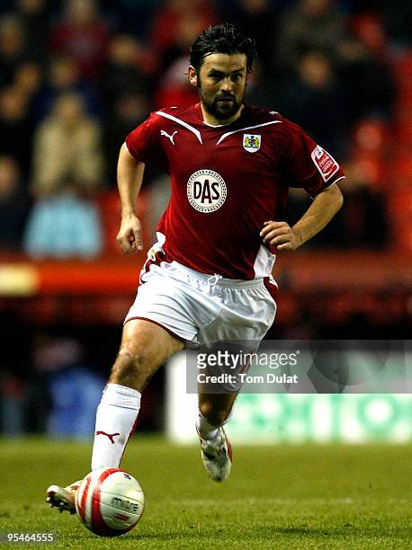 Paul Hartley of Bristol City runs with the ball during the Coca Cola Championship match between Bristol City and Watford at Ashton Gate on December...