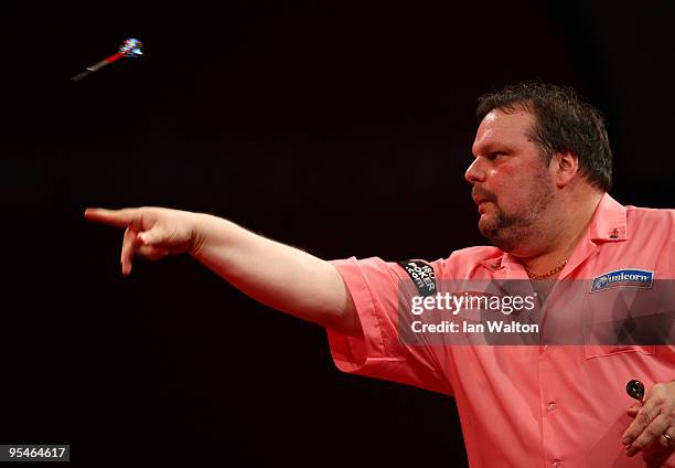 Peter Manley of England in action against Mark Webster of Wales during the 2010 Ladbrokes.com World Darts Championship Round One at Alexandra Palace...