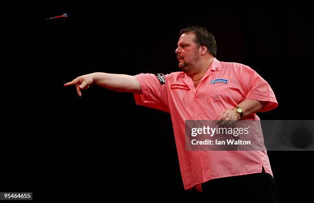 Peter Manley of England in action against Mark Webster of Wales during the 2010 Ladbrokes.com World Darts Championship Round One at Alexandra Palace...