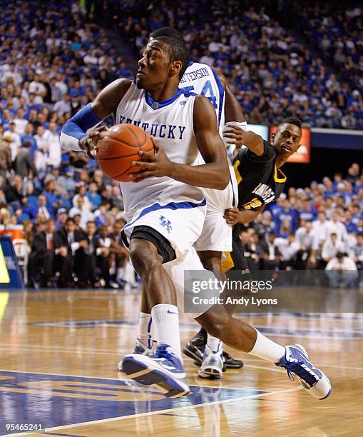 John Wall of the Kentucky Wildcats drives during the game against the Long Beach State 49ers at Rupp Arena on December 23, 2009 in Lexington,...
