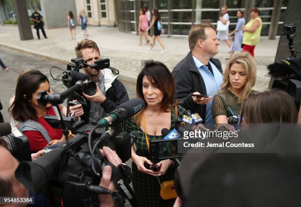Toni Natalie, a former associate of Keith Raniere, speaks to the media outside the United States Eastern District Court after a bail hearing for...