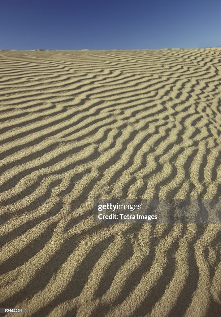 Blue Sand Ripple Rippling Sand And Blue Sky High-Res Stock Photo - Getty Images