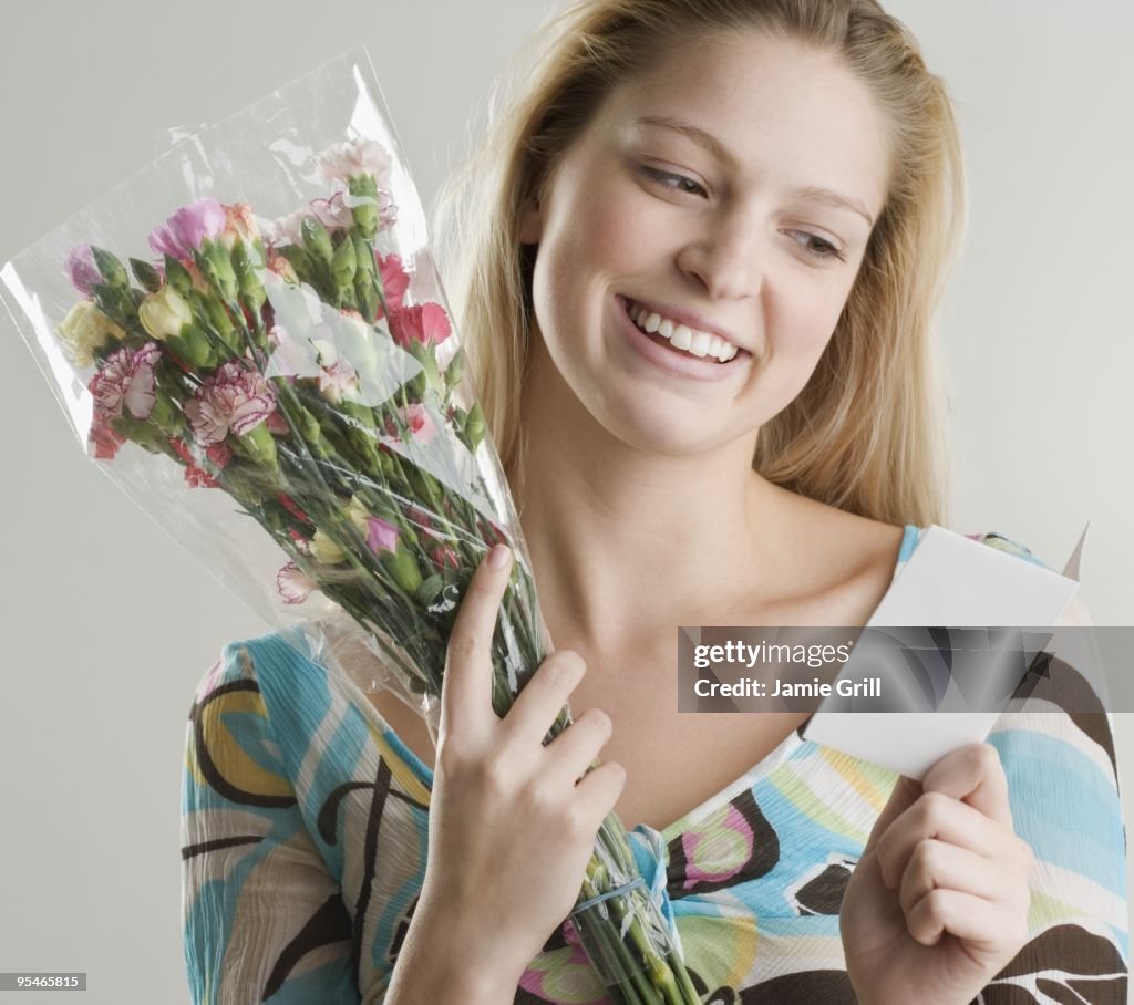 Young woman with a bouquet of flowers