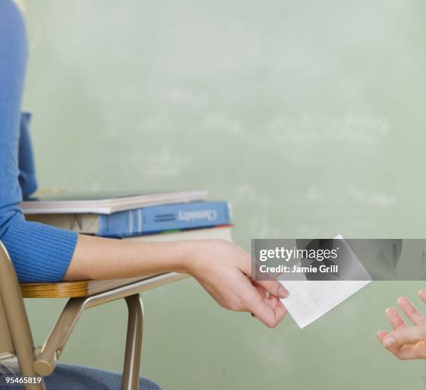Passing Through Notes Passing Note Photos and Premium High Res Pictures - Getty Images