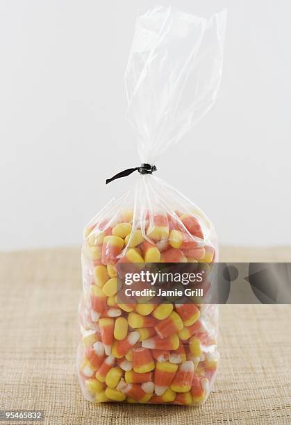 bag of candy - bag of sweets stock pictures, royalty-free photos & images