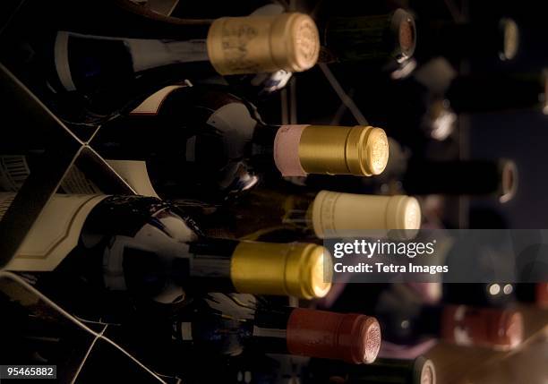 rows of wine in boxes - wine cellar stock pictures, royalty-free photos & images