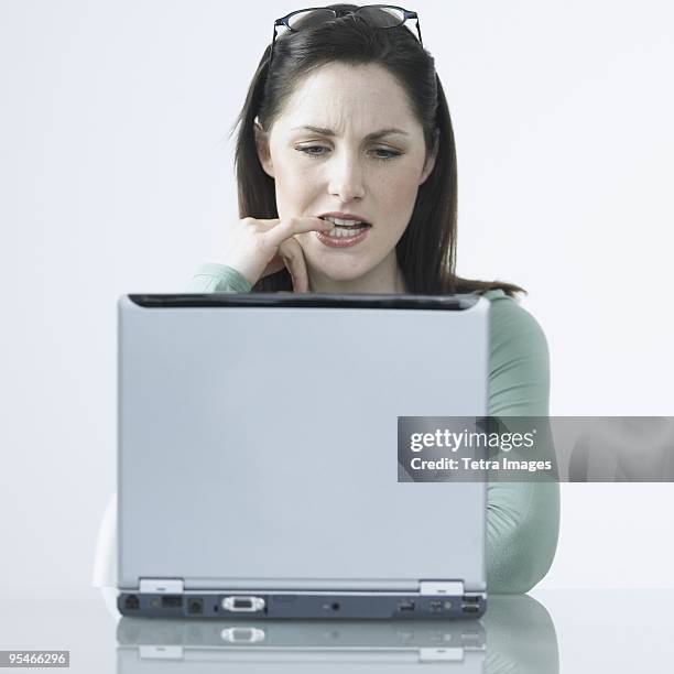 Bitting Pc 221 Women Biting Laptops Stock Photos, High-Res Pictures, and Images ...
