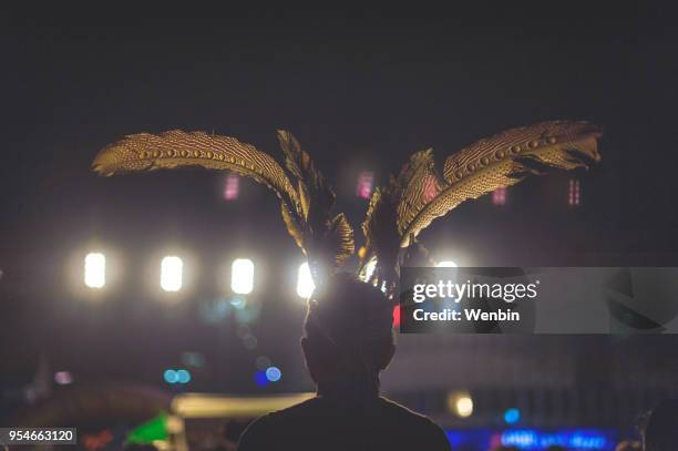 local ethnic performance team in kuching - dayak stock pictures, royalty-free photos & images