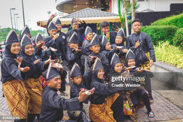 local ethnic performance team in kuching - gawai dayak stock pictures, royalty-free photos & images