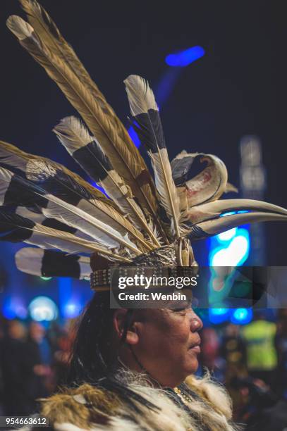 local ethnic performance team in kuching - dayak stock pictures, royalty-free photos & images