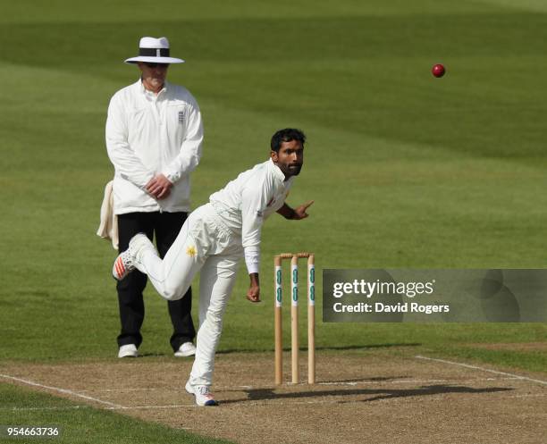 Asad Shafiq of Pakistan bowls during the tour match between Northamptonshire and Pakistan at The County Ground on May 4, 2018 in Northampton, England.