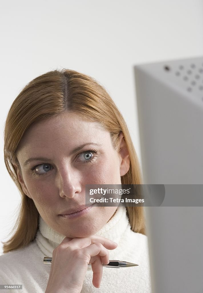 A woman working at a computer