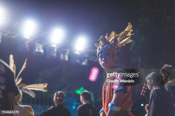 local ethnic performance team in kuching - dayak stock pictures, royalty-free photos & images