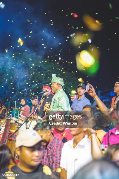local ethnic performance team in kuching - dayak stock pictures, royalty-free photos & images