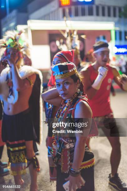 local ethnic performance team in kuching - dayak stock pictures, royalty-free photos & images