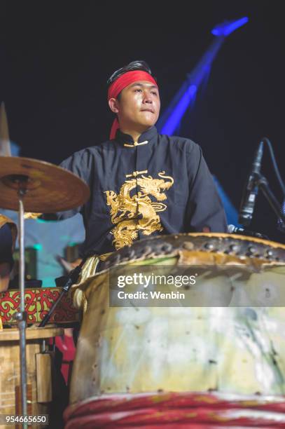 local ethnic performance team in kuching - dayak stock pictures, royalty-free photos & images