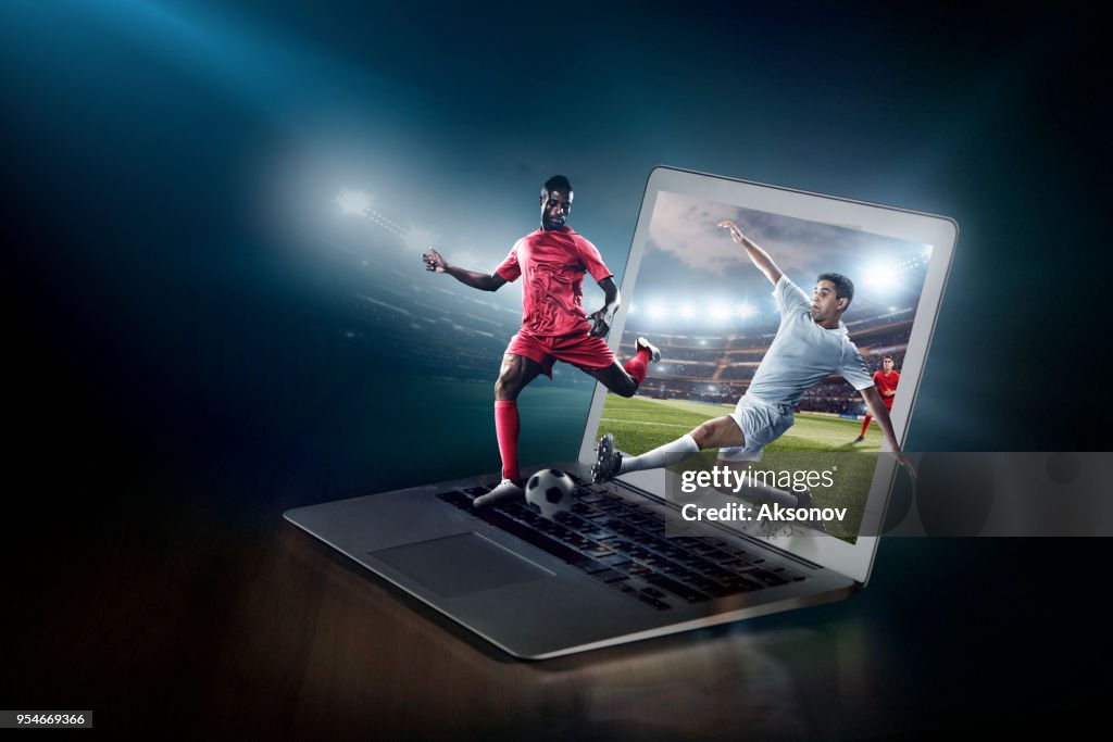 Soccer game on laptop. Live broadcast