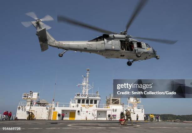 View of a MH-60S Sea Hawk helicopter during a humanitarian and disaster relief exercise aboard Military Sealift Command hospital ship USNS Mercy at...