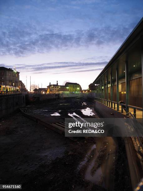 Construction yard, Darsena area, old river harbour, Porta Ticinese district, Milan, Lombardy, Italy, Europe.