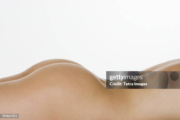 woman's bare back and bottom - bare bottom women stockfoto's en -beelden