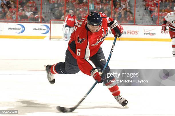 Eric Fehr of the Washington Capitals takes a shot during a NHL hockey game against the Carolina Hurricanes on December11, 2009 at the Verizon Center...