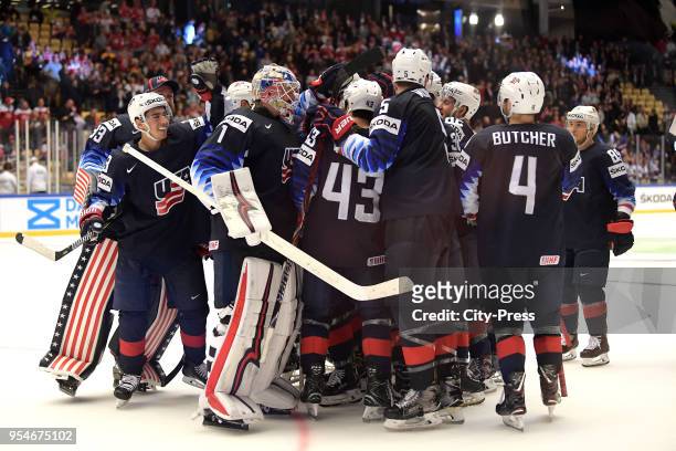 Johnny Gauderau, Keith Kinkaid, Quinn Hughes, Connor Murphy, Will Butcher and Cam Atkinson of Team USA celebrate during the World Championship game...